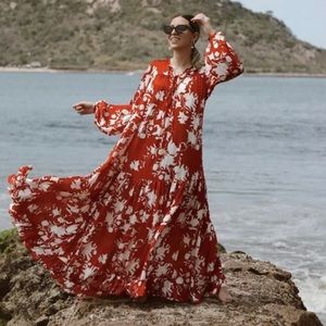 H&M x Johanna Ortiz red satin dress